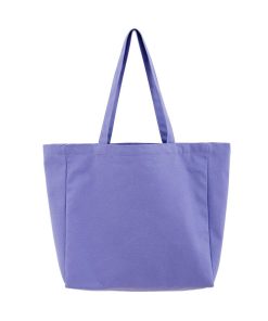What are the benefits of using a cotton canvas tote bag over other types of tote bags?
